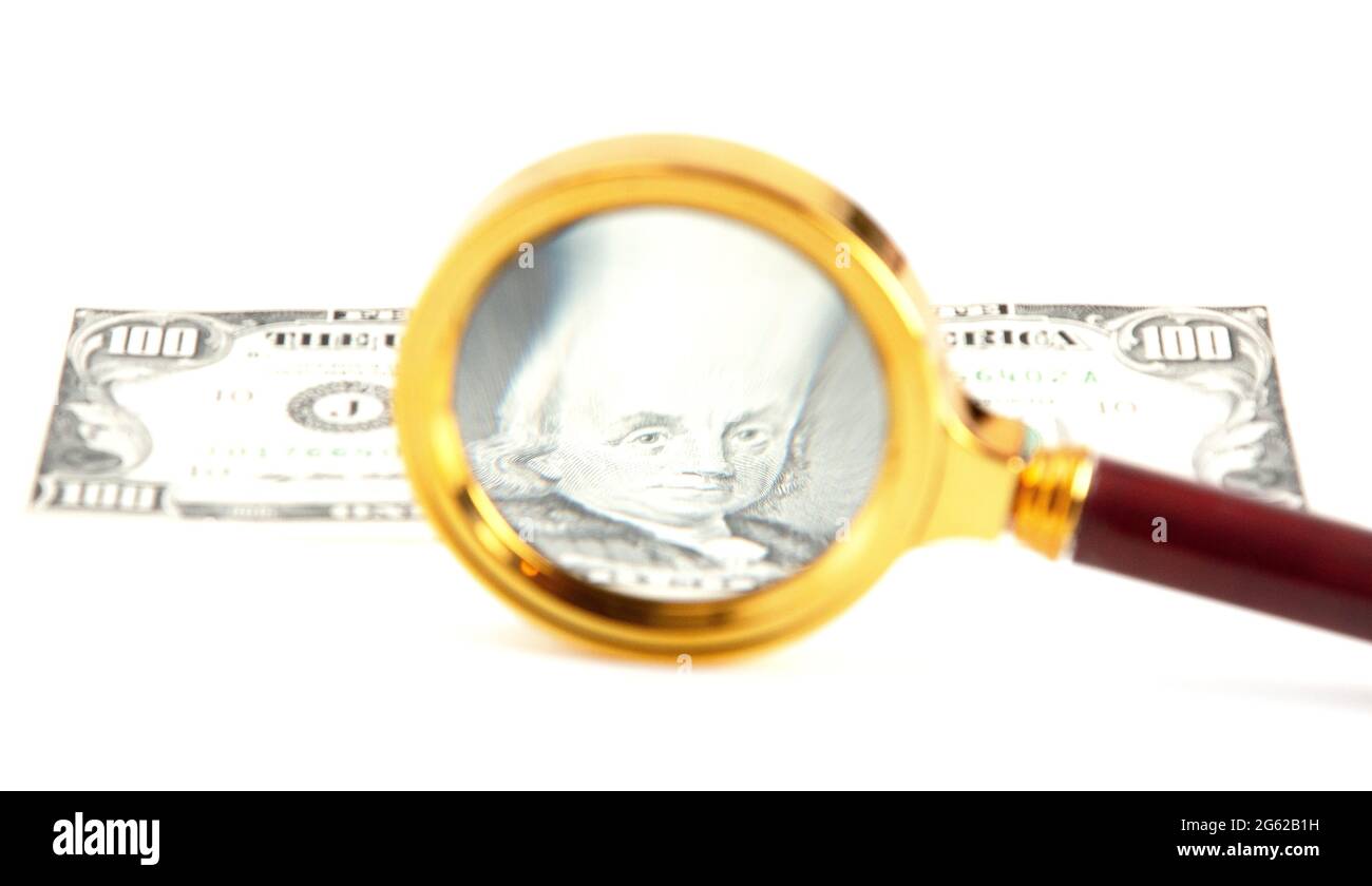 Examining the American Dollar Close Up with a Magnifying Glass Stock