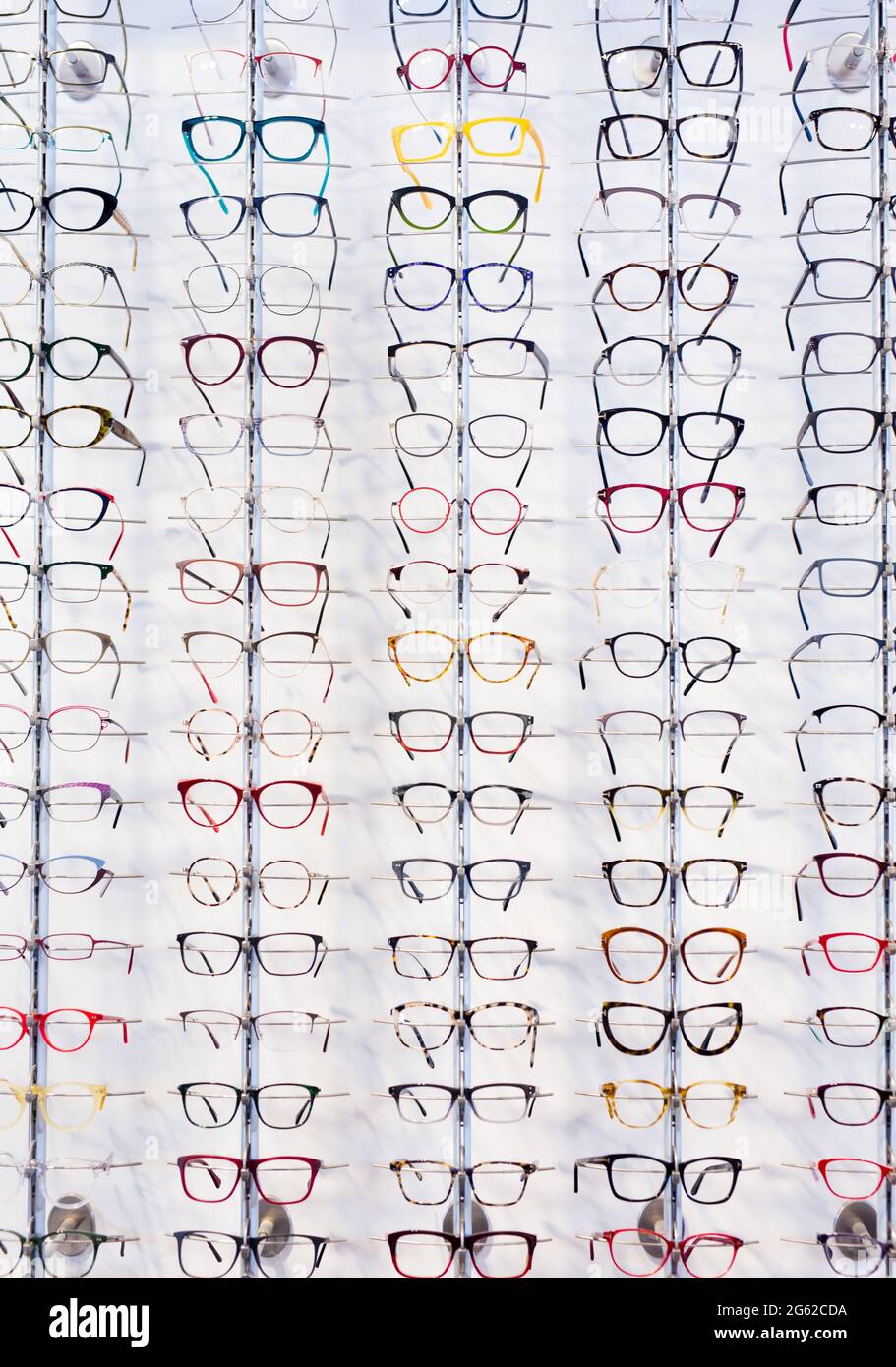 Glasses showcase in modern optic shop Stock Photo - Alamy