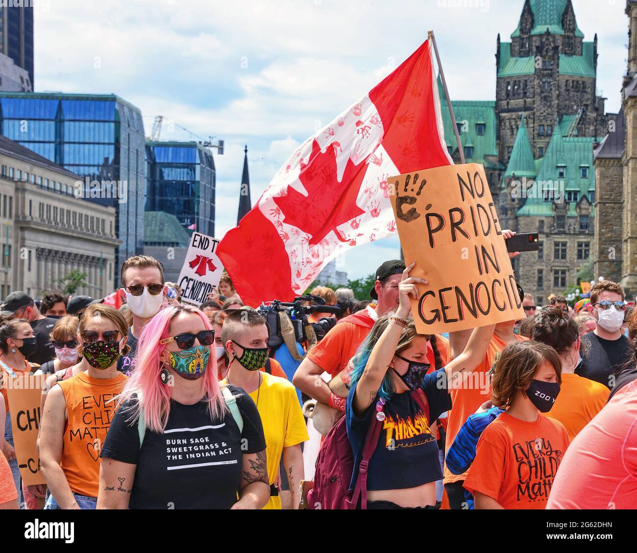 Ottawa, Canada - July 1, 2021: Thousands marched in the Cancel Canada Day march which ended up with a rally on Parliament Hill. They believe it is not proper to celebrate Canada