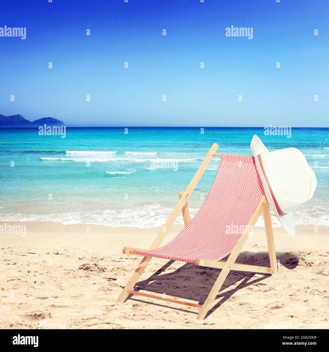 Wooden deck chairs on sandy beach near sea. Holiday background Stock ...