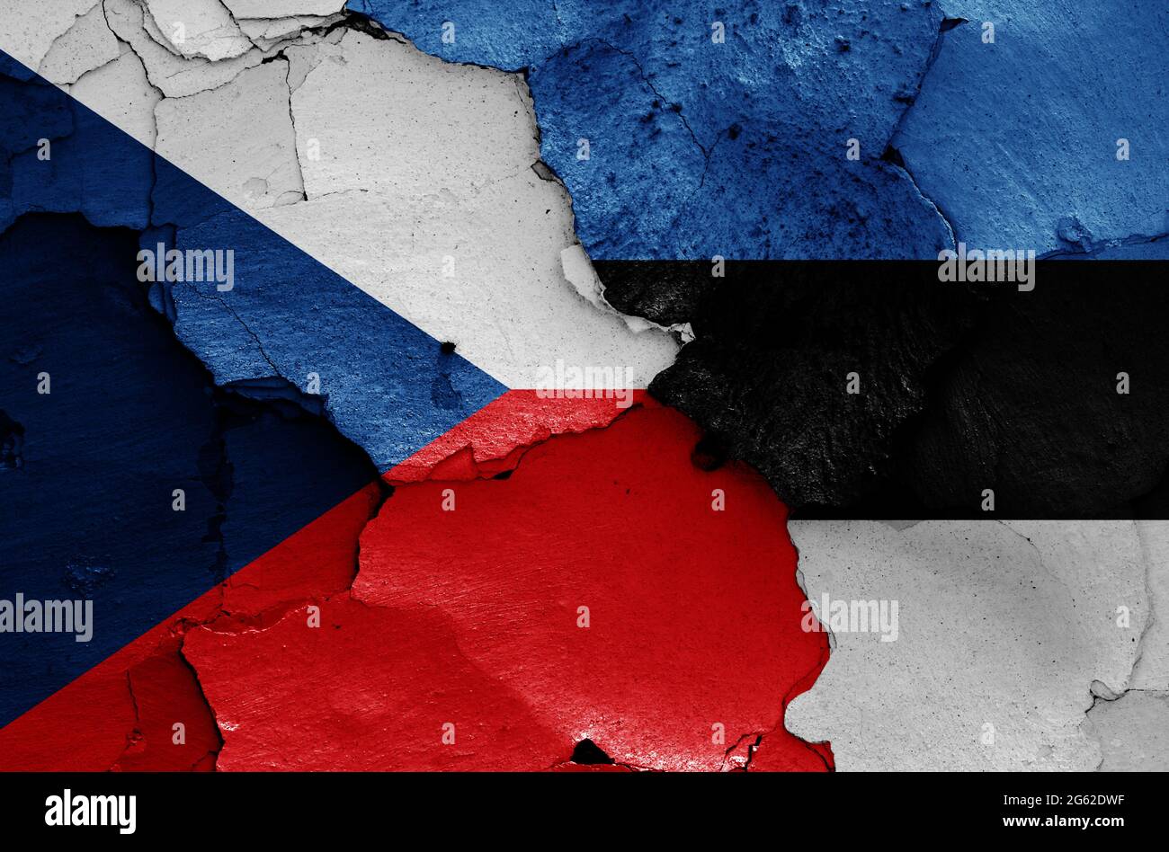 flags of Czechia and Estonia painted on cracked wall Stock Photo