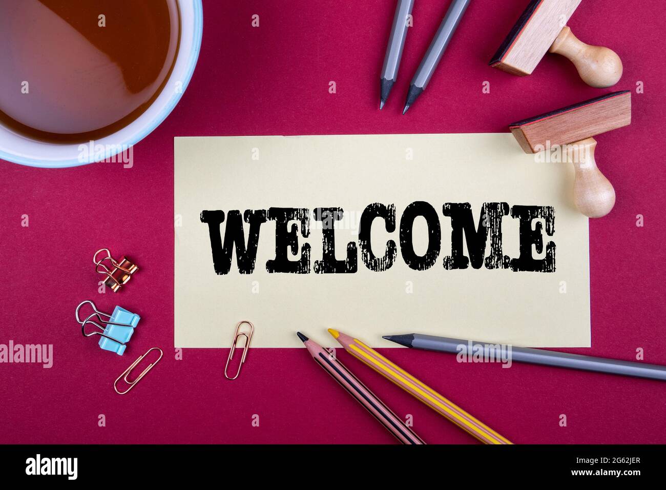 Sheet of paper and office supplies on a red table Stock Photo Alamy