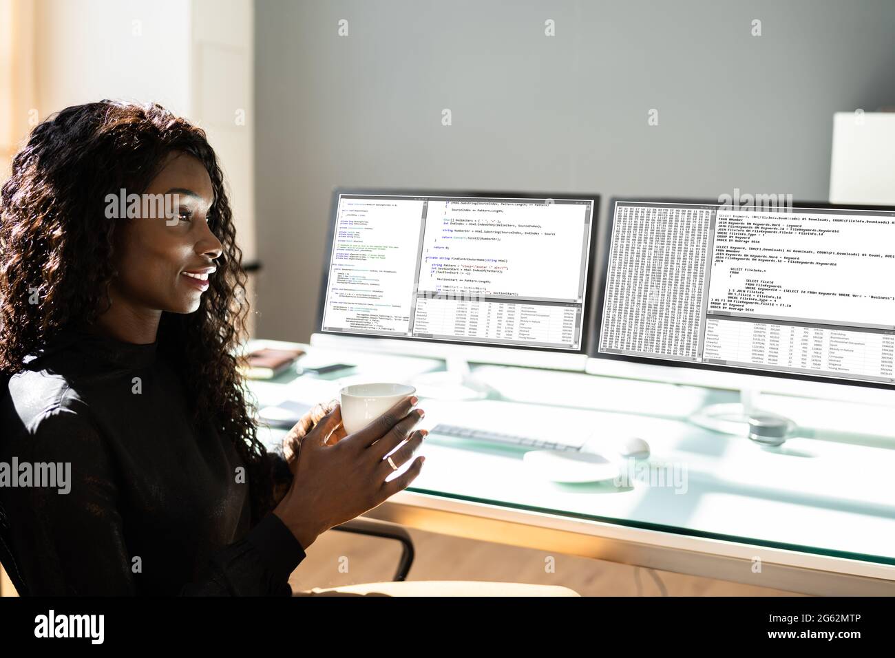 African American Woman Programmer. Girl Coding On Computer Stock Photo ...