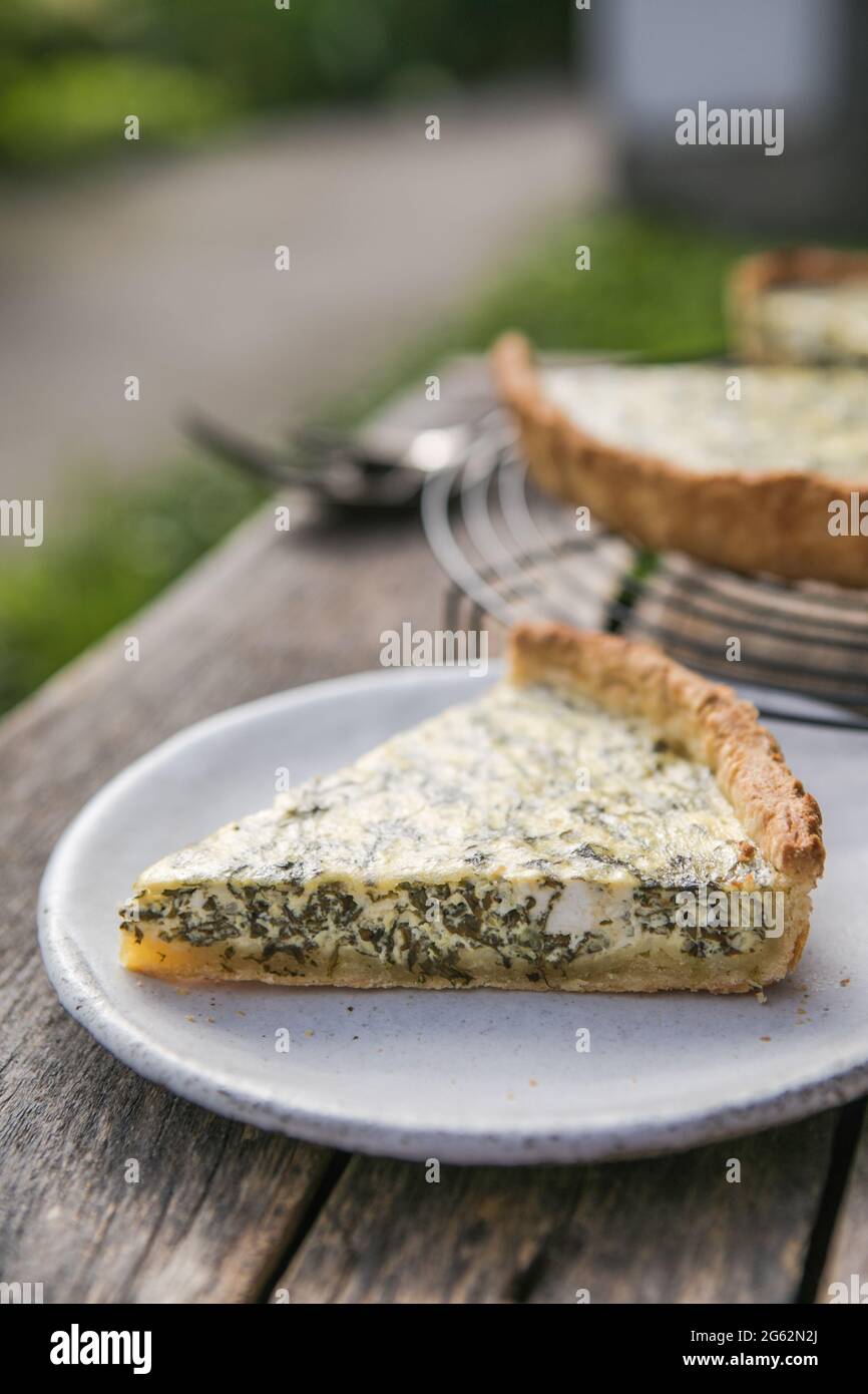 Quiche with spinach traditional dish of french cuisine. Spinach tart