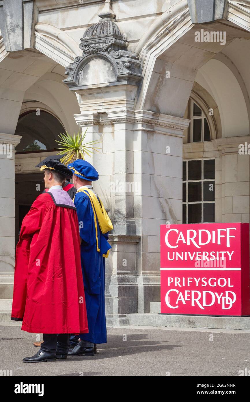 Students with academic dresses celebrating graduation day in Cardiff