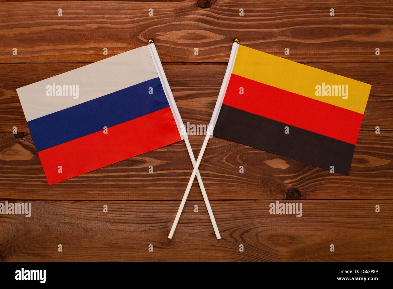 Flag of Russia and flag of Germany crossed with each other. The image illustrates the relationship between countries. Photography for video news on TV Stock Photo