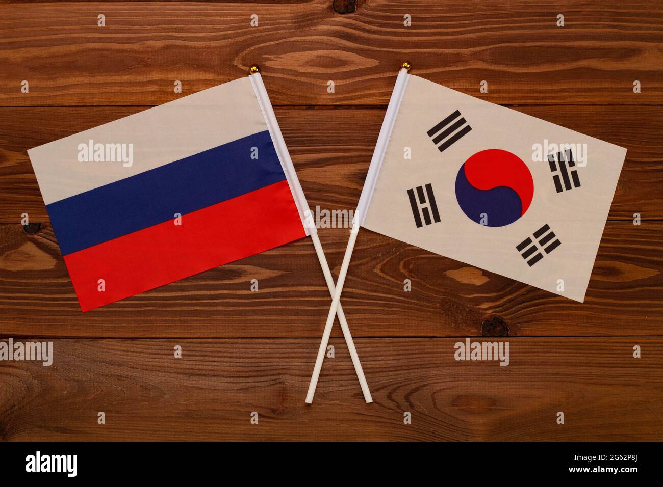 Flag of Russia and flag of South Korea crossed with each other. The image illustrates the relationship between countries. Photography for video news Stock Photo