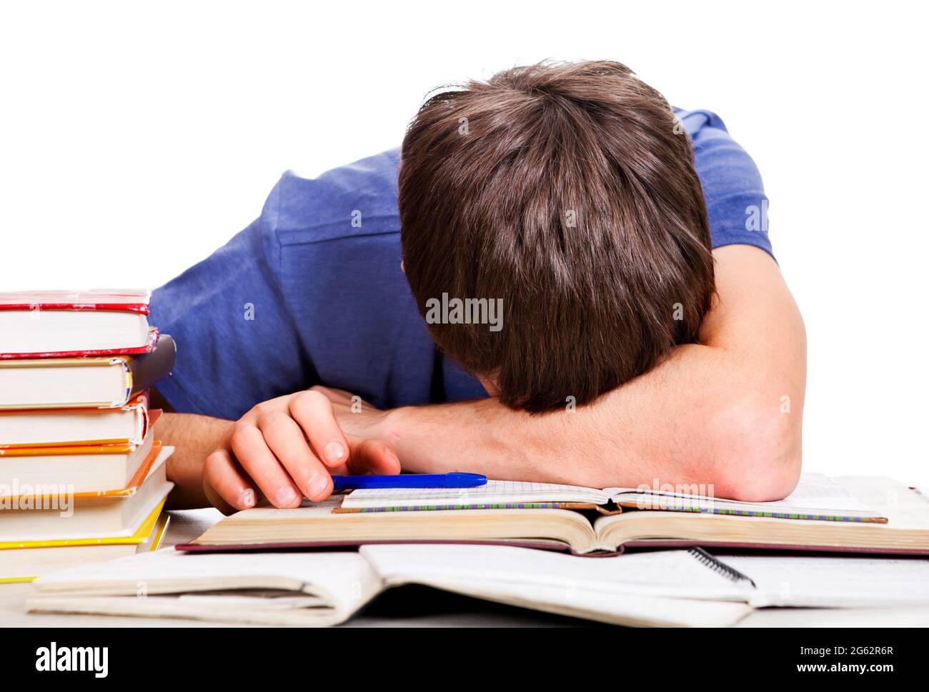 Tired Student sleep with a Books on the White Background Stock Photo