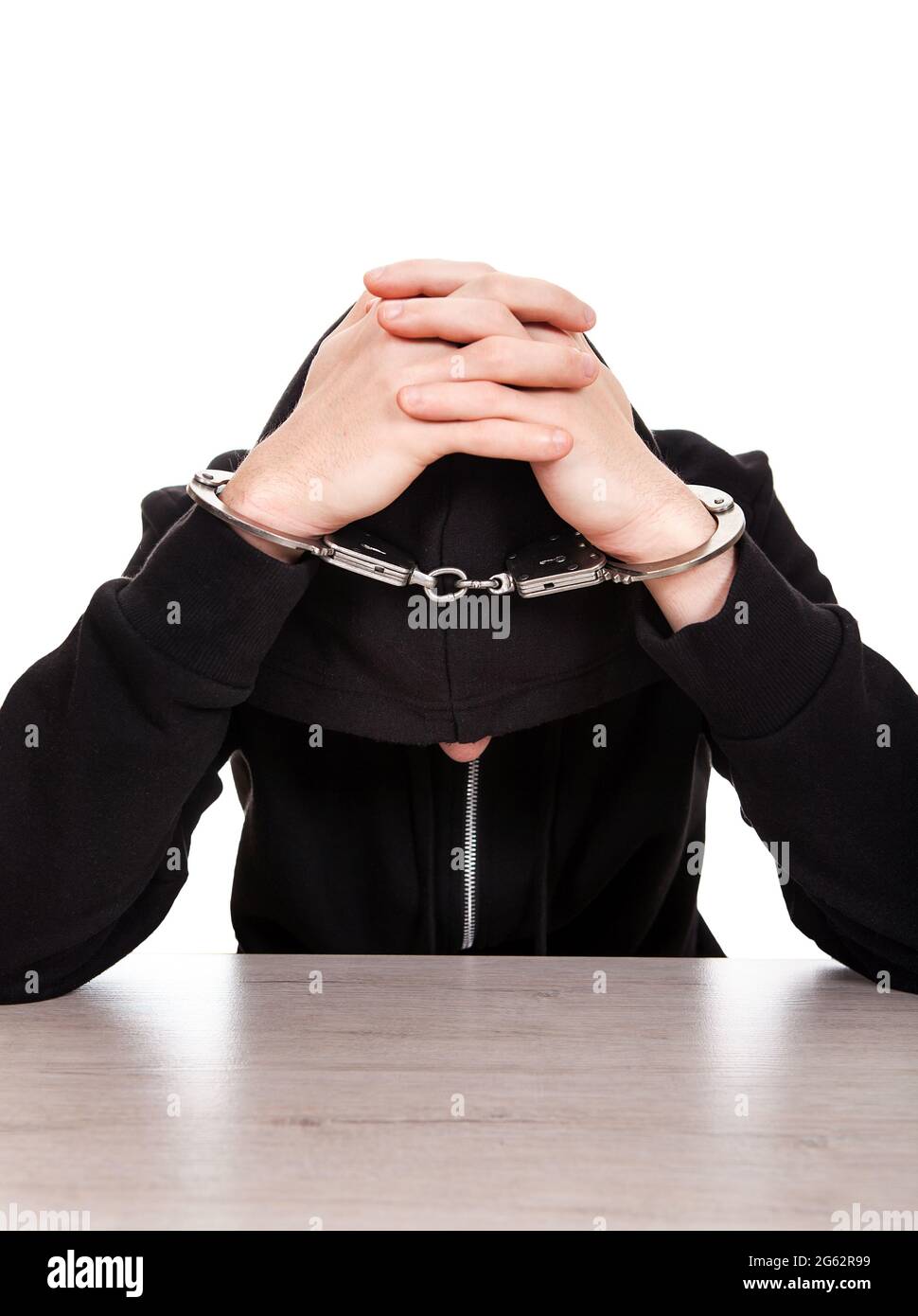 Man in Handcuffs on the White Background Stock Photo