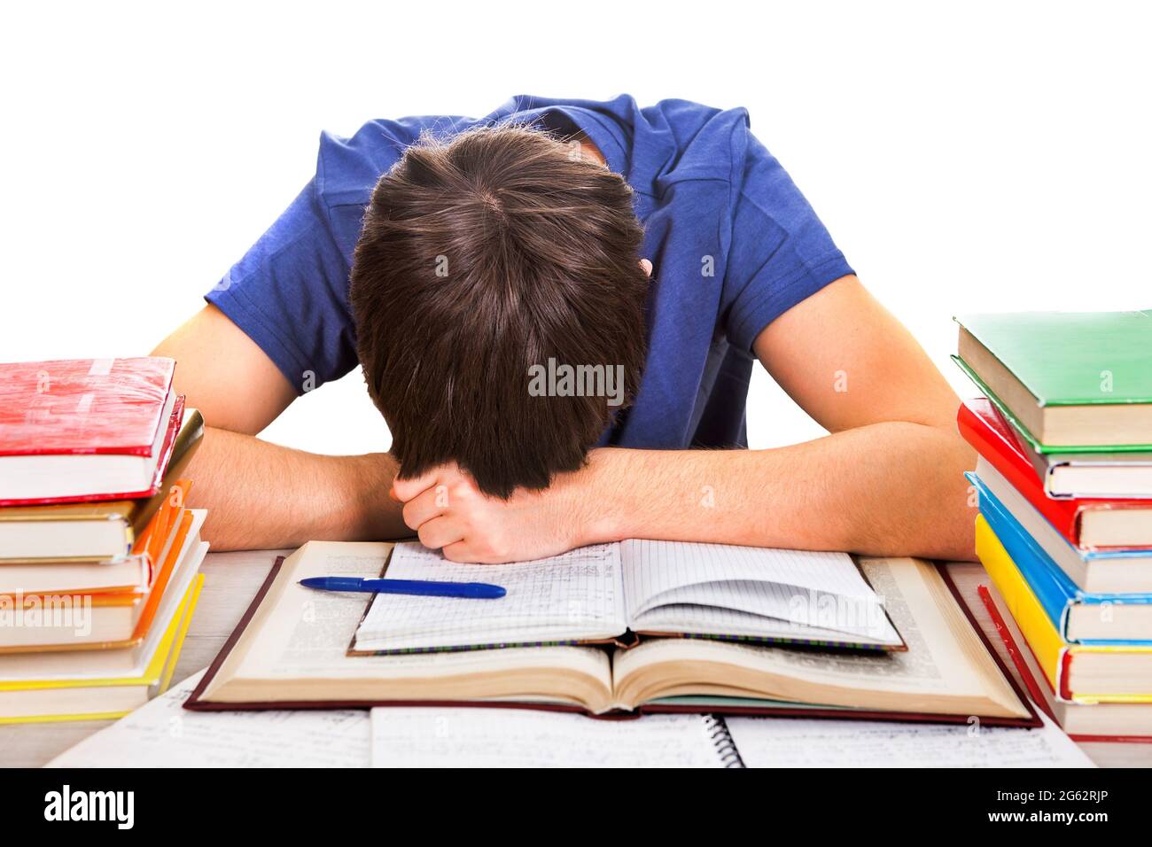 Tired Student sleep on the Book on the White Background Stock Photo