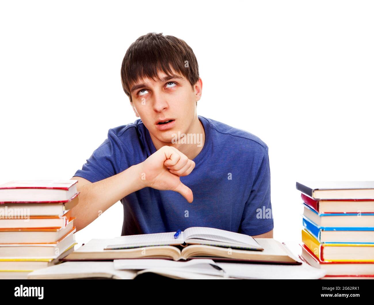 Tired Student show Thumb Down Gesture on the White Background Stock Photo