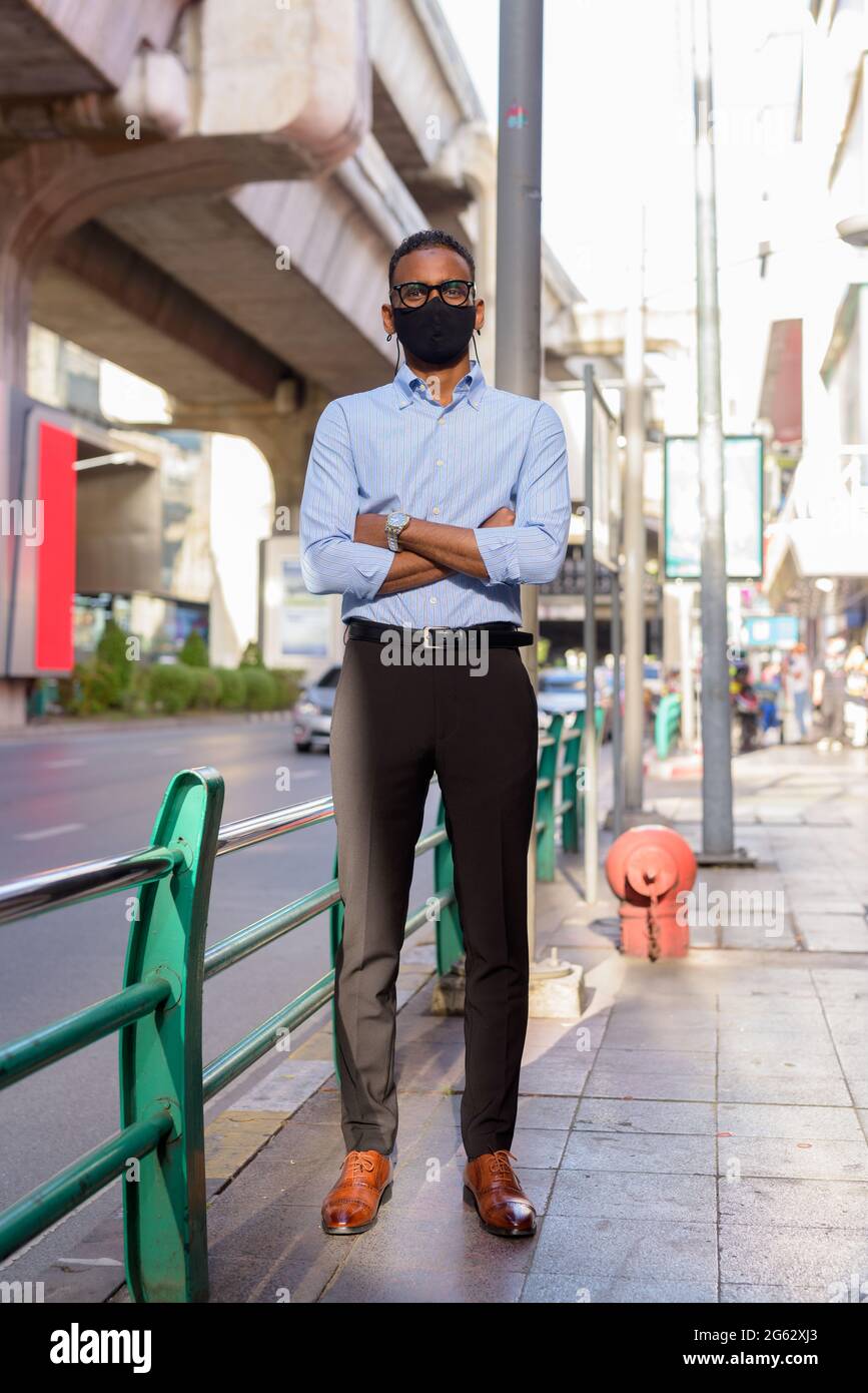 Full length black guy wearing mask hi-res stock photography and images ...