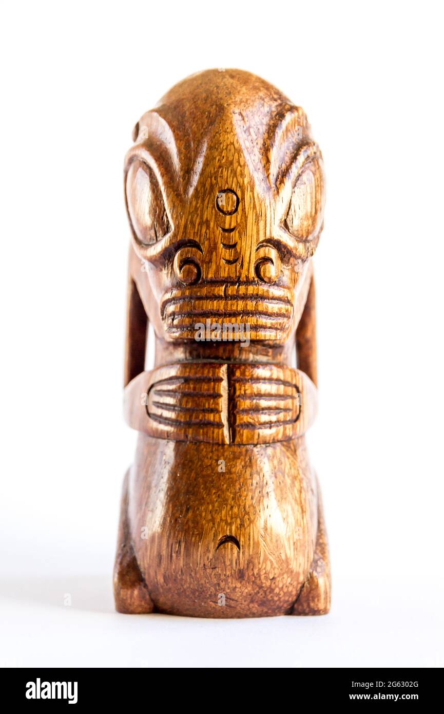 traditional wooden Polynesian tiki from Marquesas Islands. Isolated on white background Stock Photo