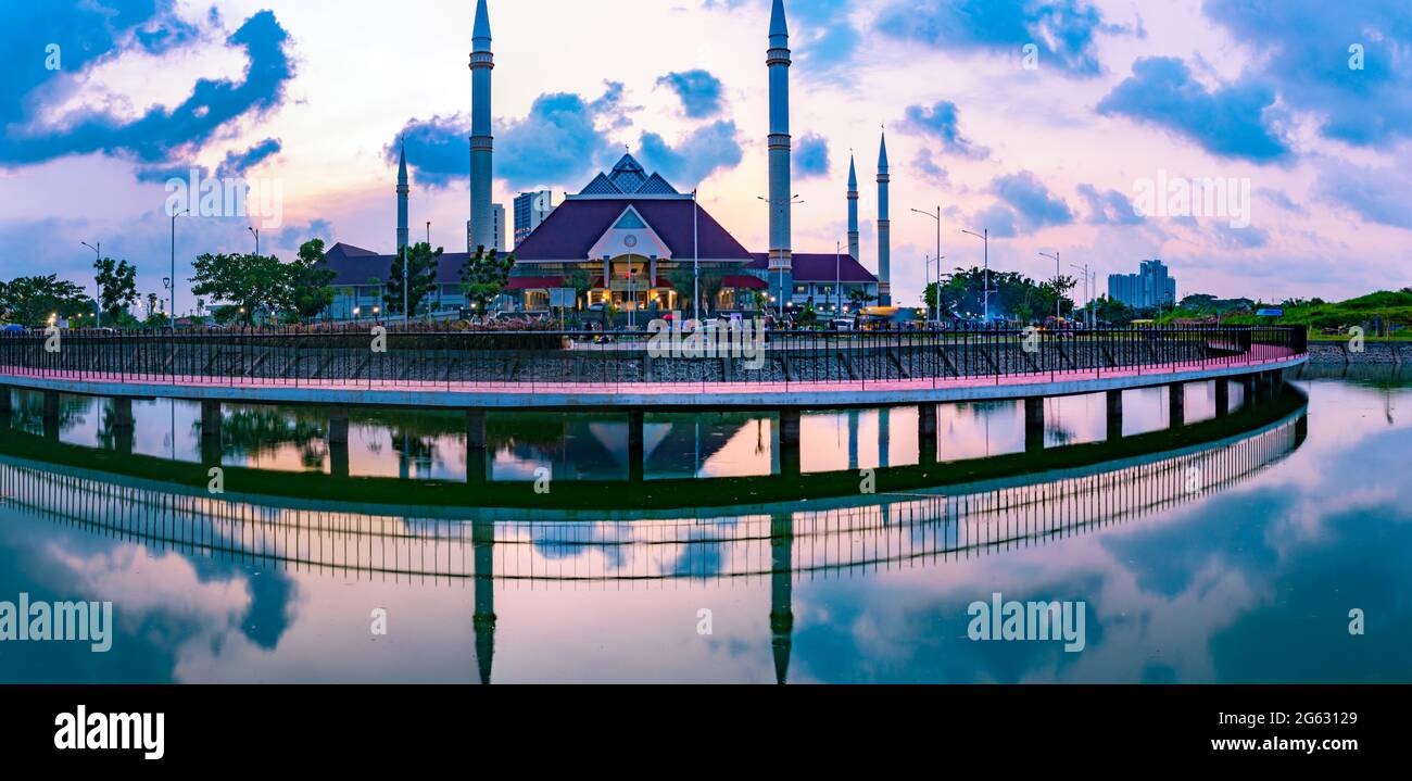 Jakarta, Indonesia - CIRCA Apr 2021: The exterior of Hasyim Asyari Grand Mosque in West Jakarta, Indonesia; with beautiful sunset sky. Stock Photo