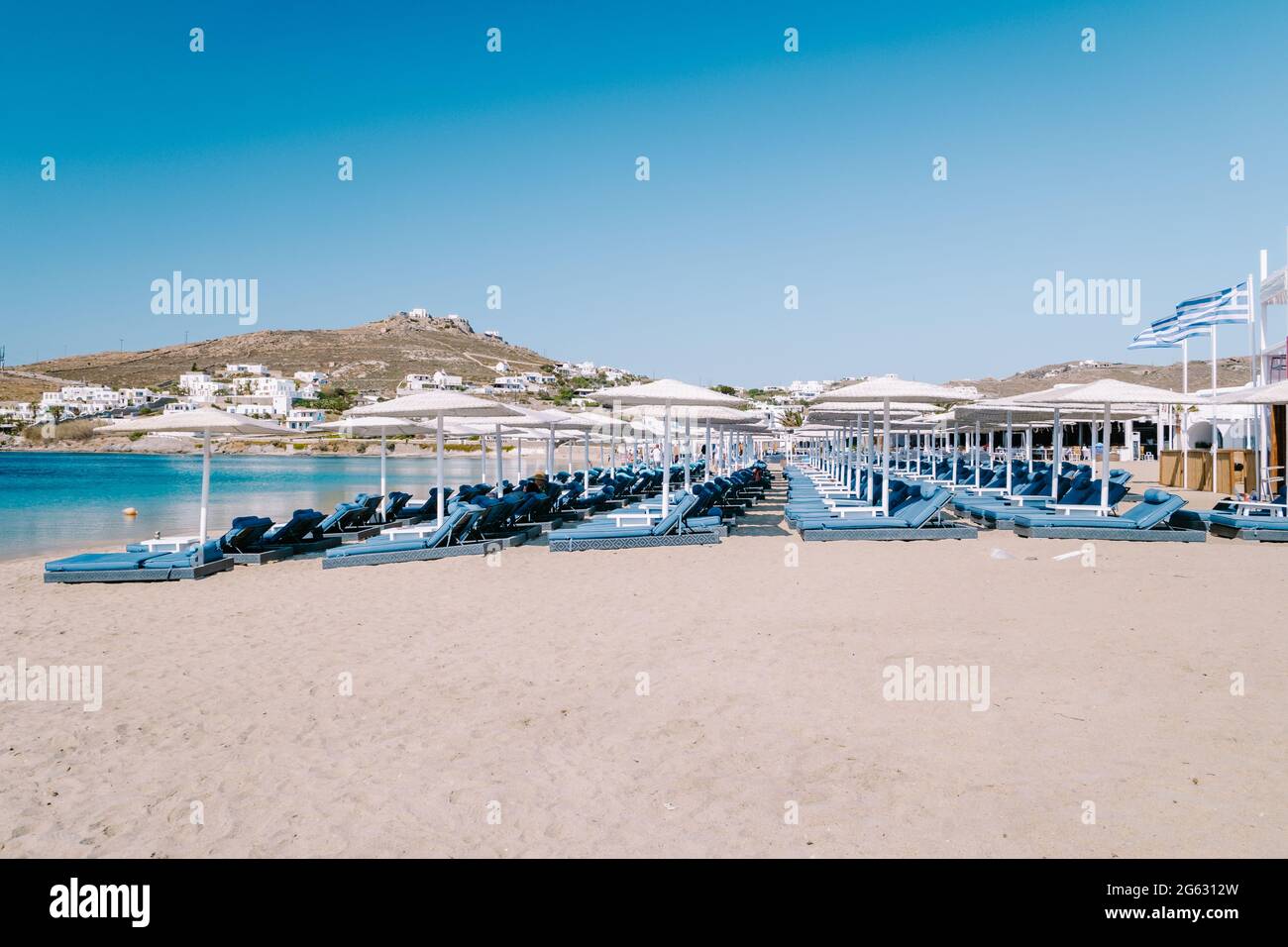 Ornos beach Mykonos island, famous Ornos beach organized with sun beds
