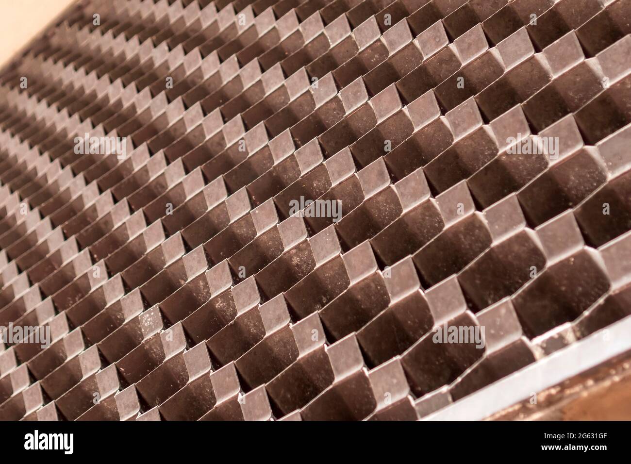 Abstract checkered grid exterior wall pattern with perspective. Selective focus. Diagonal lines. Selective focus Stock Photo