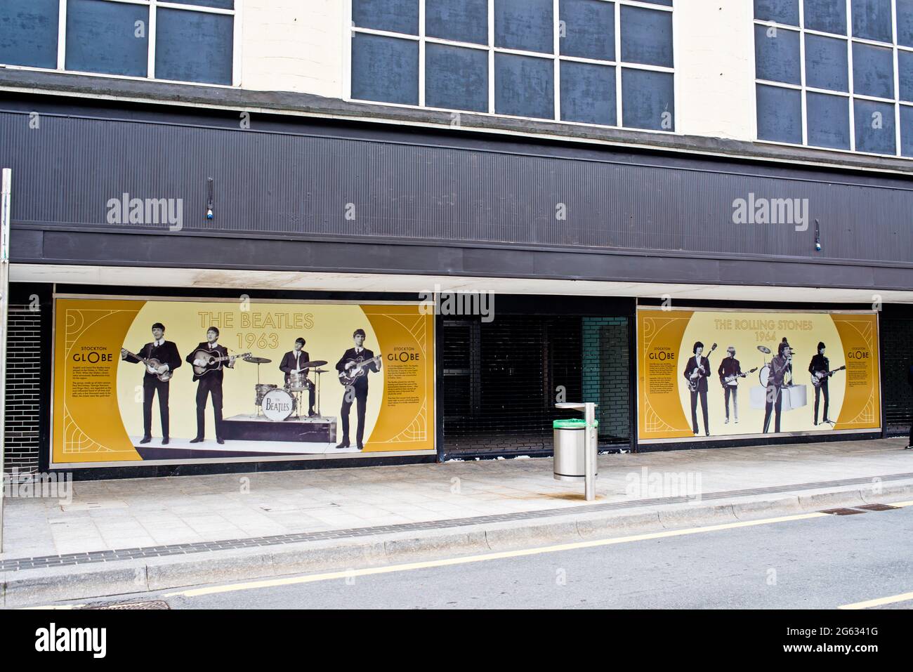Ex Debenhams Store front window, Images of the Rolling stones and The Beatles who played at the refurbished Globe Theatre, Stockton on Tees, Cleveland Stock Photo