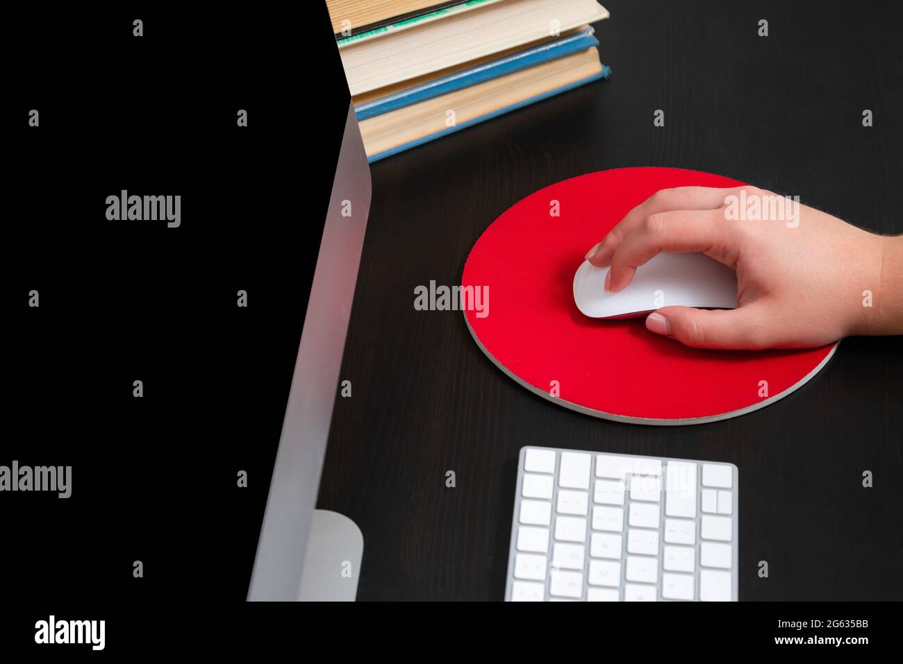 Close up of hands typing keyboard and using mouse at the office ...