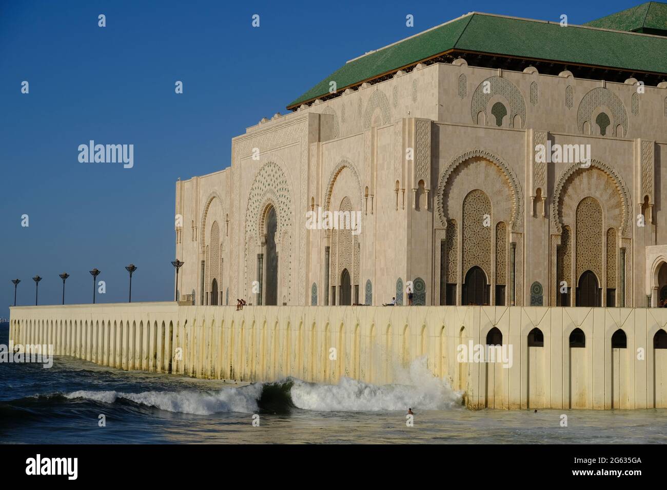 Morocco Casablanca - Hassan II Mosque shoreline with breakwaters Stock Photo