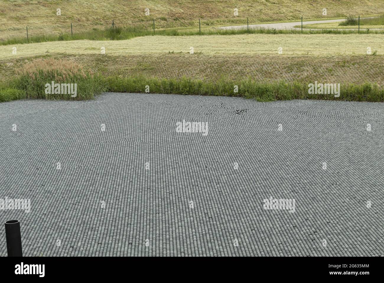 Preparing the reservoir for conservation and filling with black plastic