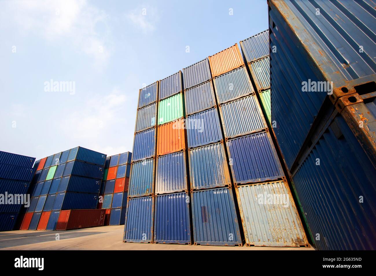 Container Cargo Port Ship Yard Storage Handling of Logistic Transportation Industry. Row of Stacking Containers of Freight Import/Export Distribution Stock Photo