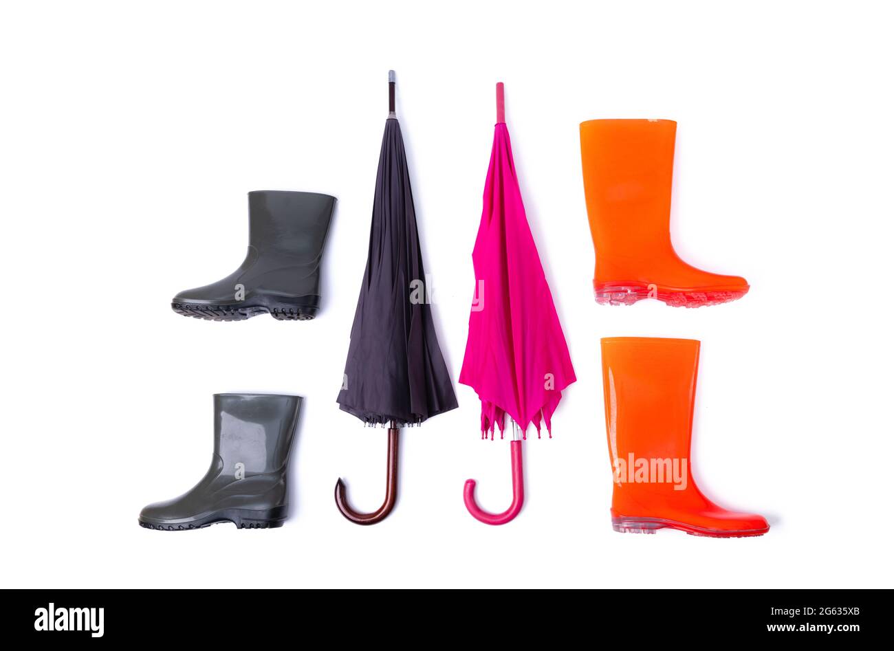 Rubber shoes and umbrella for couple isolated on white background. Rain