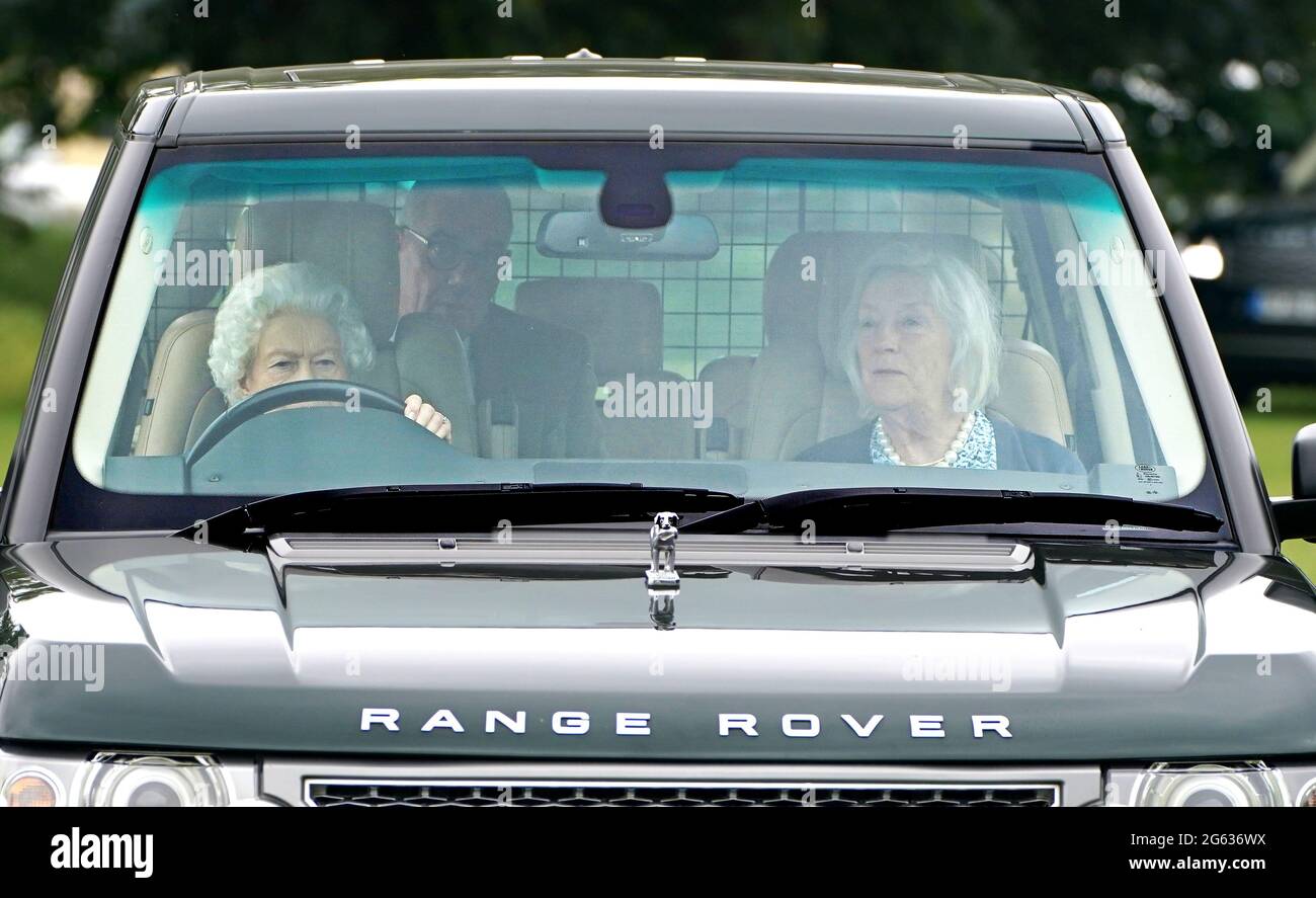 Queen Elizabeth II drives a Range Rover at the Royal Windsor Horse Show, Windsor. Picture date