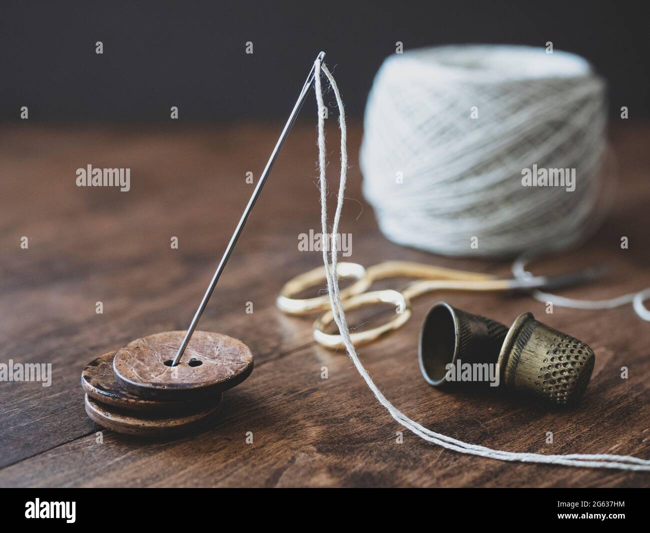 Wooden reel of thread hi-res stock photography and images - Alamy
