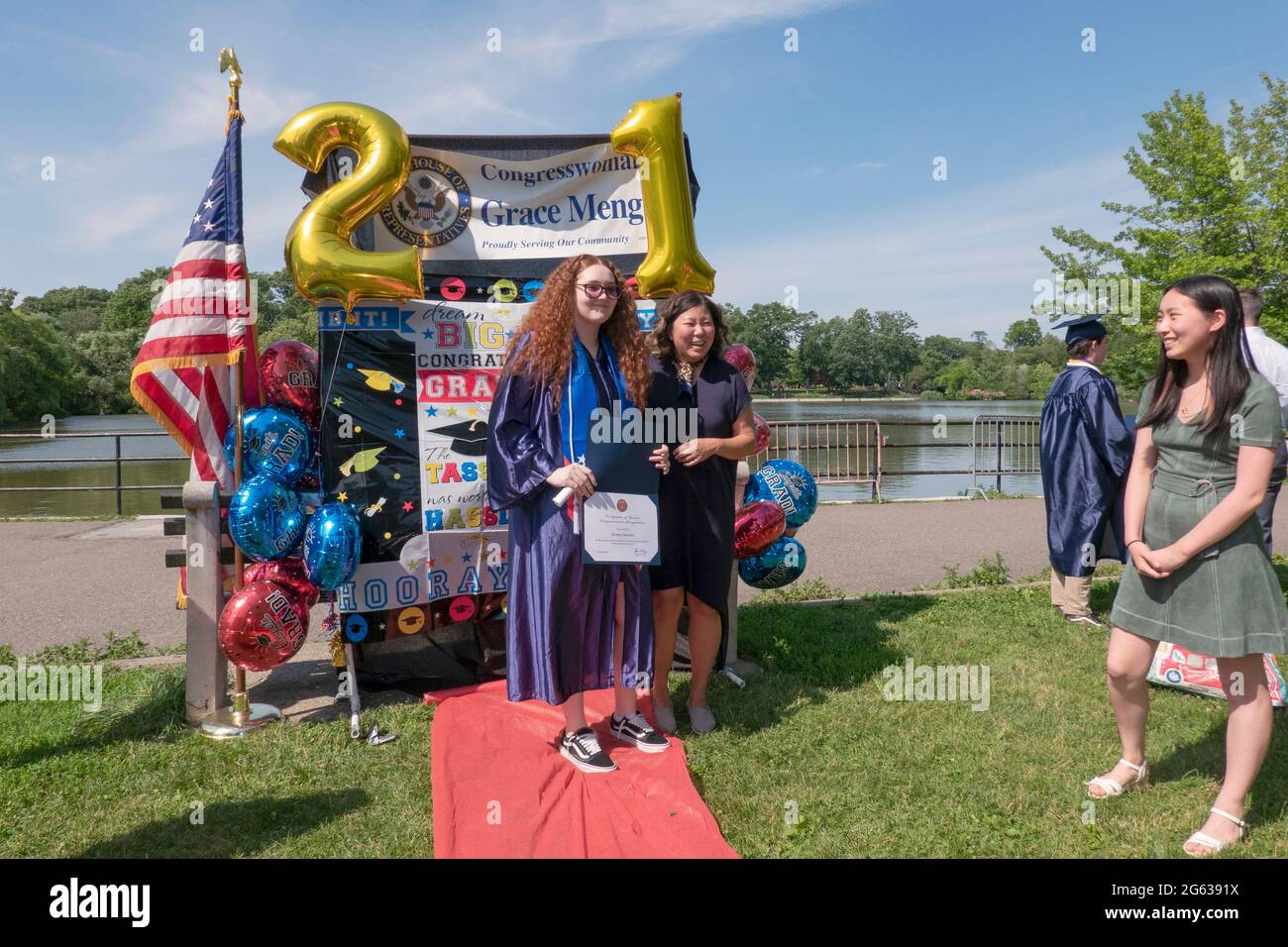 With graduations severely curtailed by covid, Congresswoman Grace Meng invited students to an outdoor celebration. In a park in Queens, New York. Stock Photo