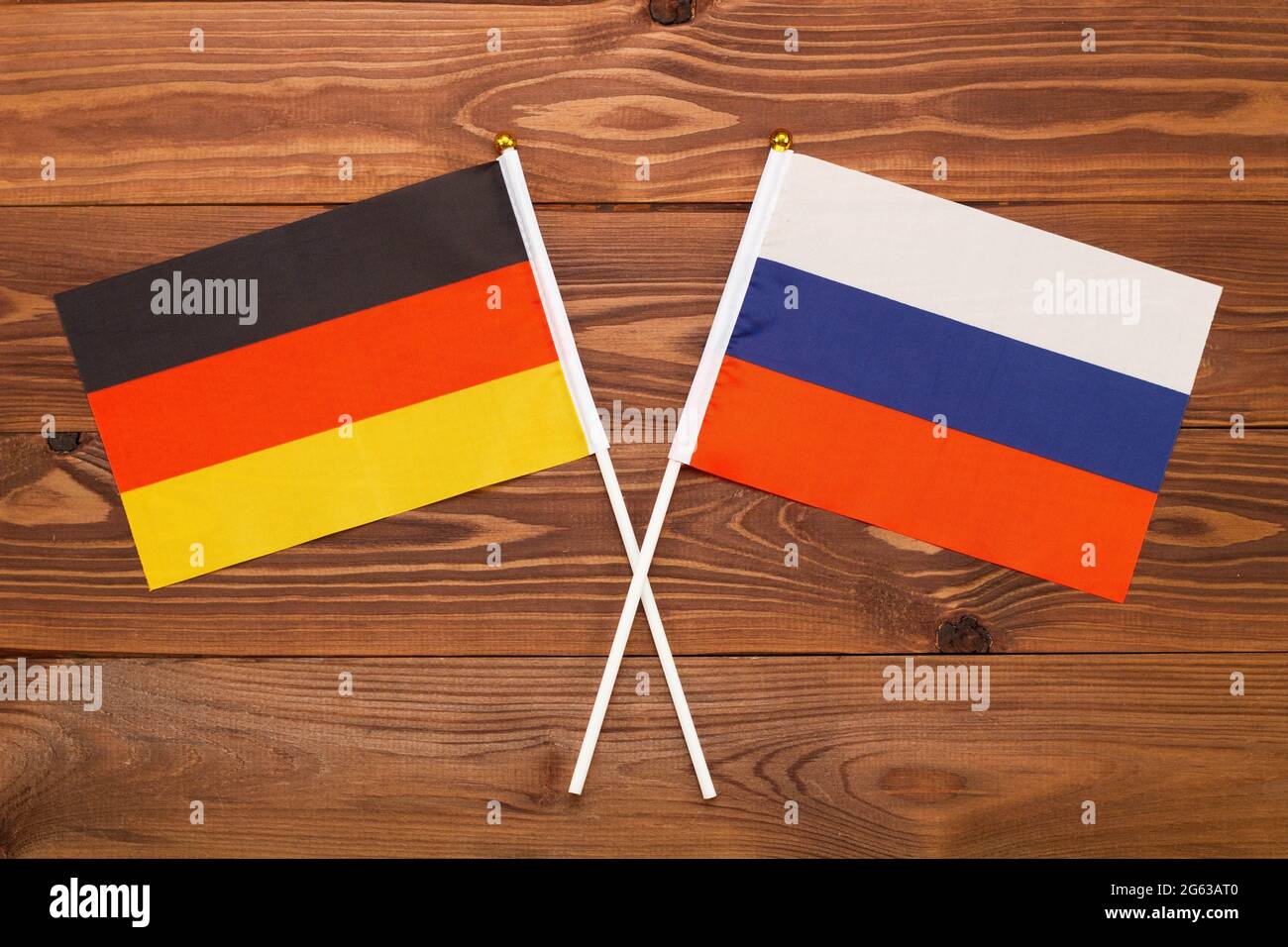 Flag of Germany and flag of Russia crossed with each other. The image illustrates the relationship between countries. Photography for news Stock Photo