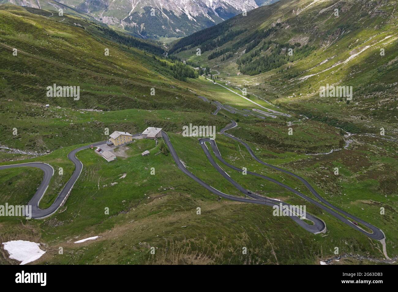 Aerial view of the serpentines on the north side of the Splügen Pass in the Swiss canton of Graubünden. Stock Photo