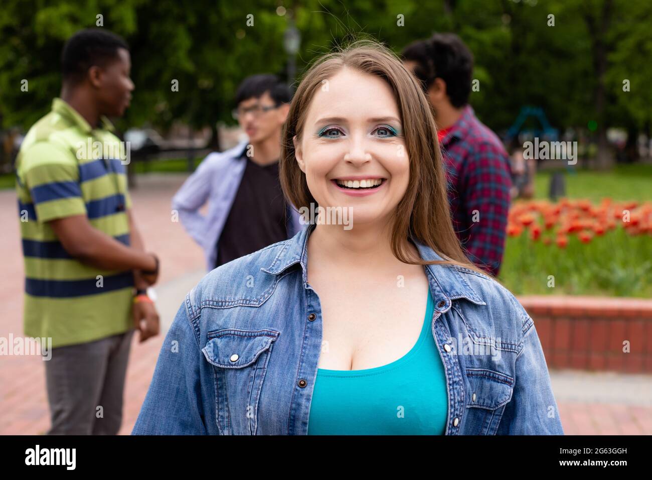 Portrait of young beautiful smiling girl outdoors Stock Photo - Alamy