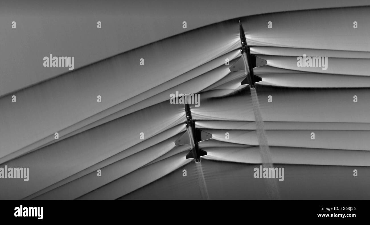 EDWARDS AFB, USA - 18 December 2018 - Composite image of Background Oriented Schlieren (BOS) data (contour) with a cut-out images of the T-38’s during Stock Photo