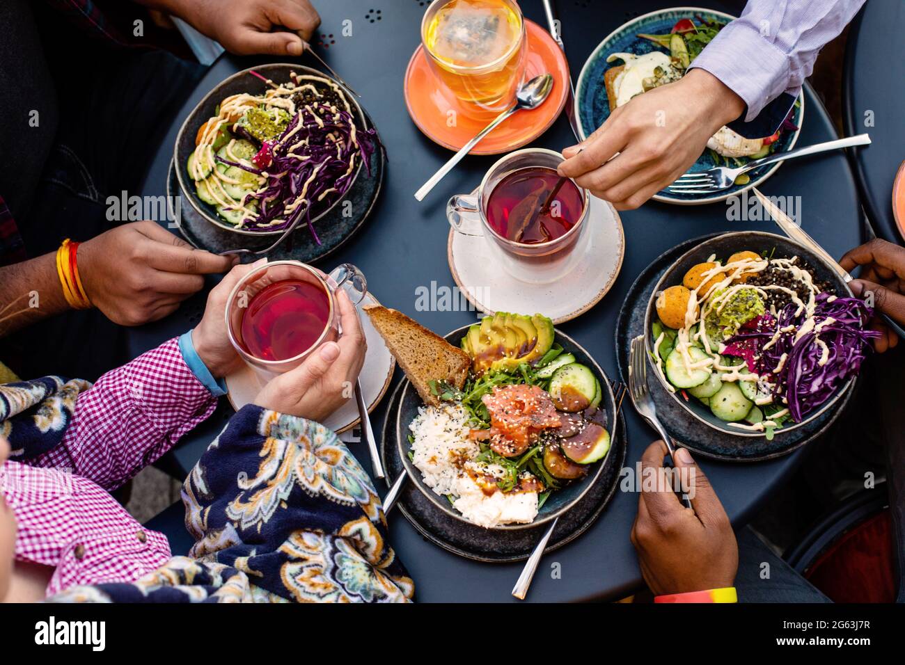 Top view cafe table with bowls of salad Stock Photo - Alamy