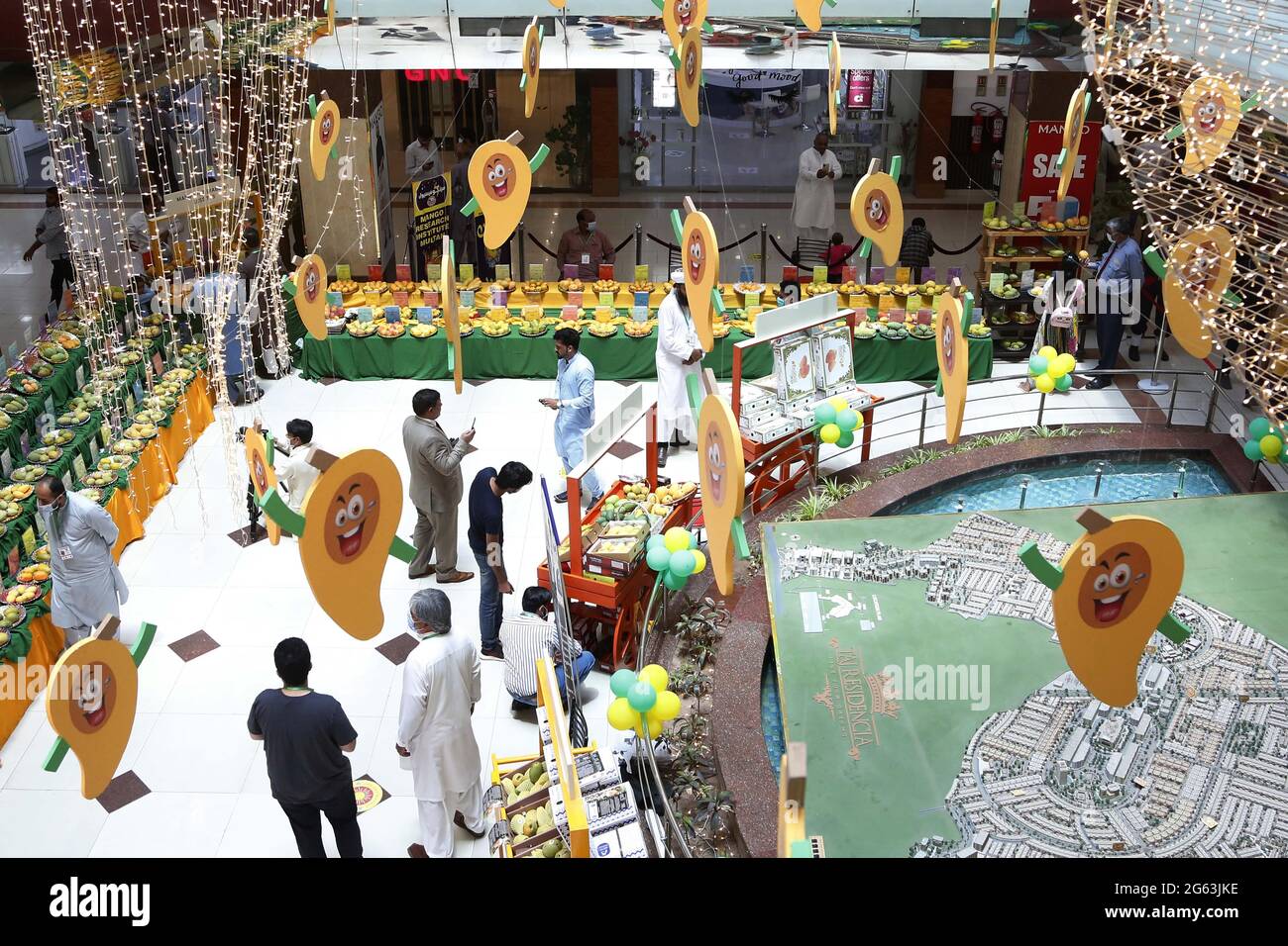 Islamabad, Pakistan. 2nd July, 2021. People visit a mango festival in