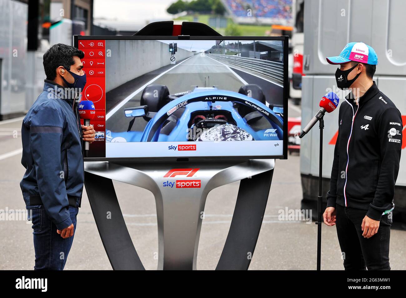 Spielberg, Austria. 02nd July, 2021. (L to R) Karun Chandhok (IND) Sky Sports F1 Presenter with Guanyu Zhou (CHN) Alpine F1 Team Test Driver