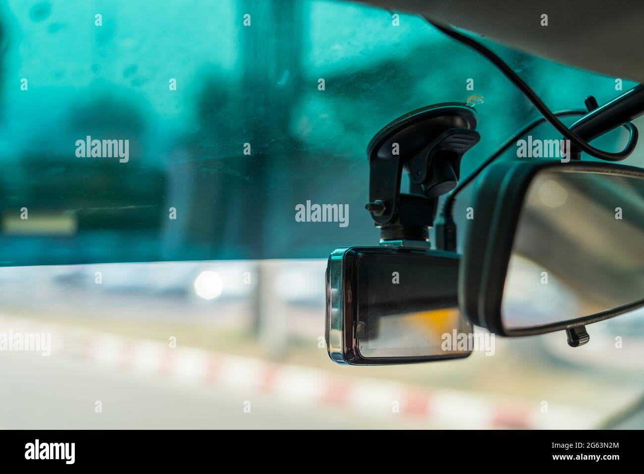 https://c8.alamy.com/comp/2G63N2M/video-recorder-next-to-a-rear-view-mirror-cctv-car-camera-for-safety-on-the-road-accident-2G63N2M.jpg
