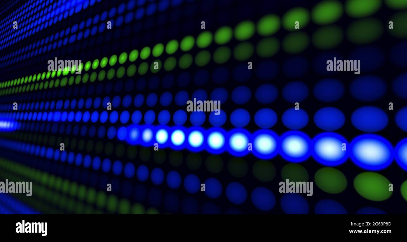 Rows of green and blue led light diodes glowing and darkening on blakc background Stock Photo