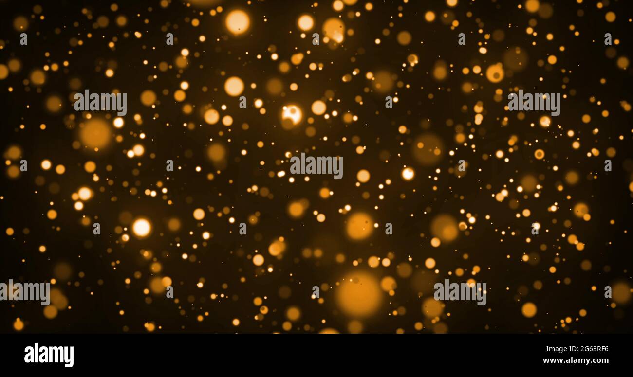 Image of glowing gold spots of light moving in hypnotic motion on brown