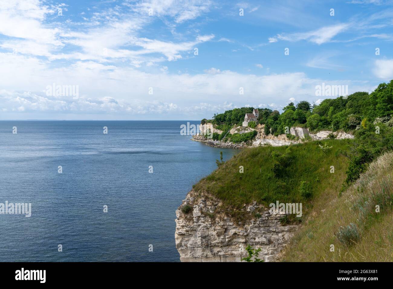 A view of the church at Hojerup on top of the white chalkstone cliffs of Stevns Klint Stock Photo