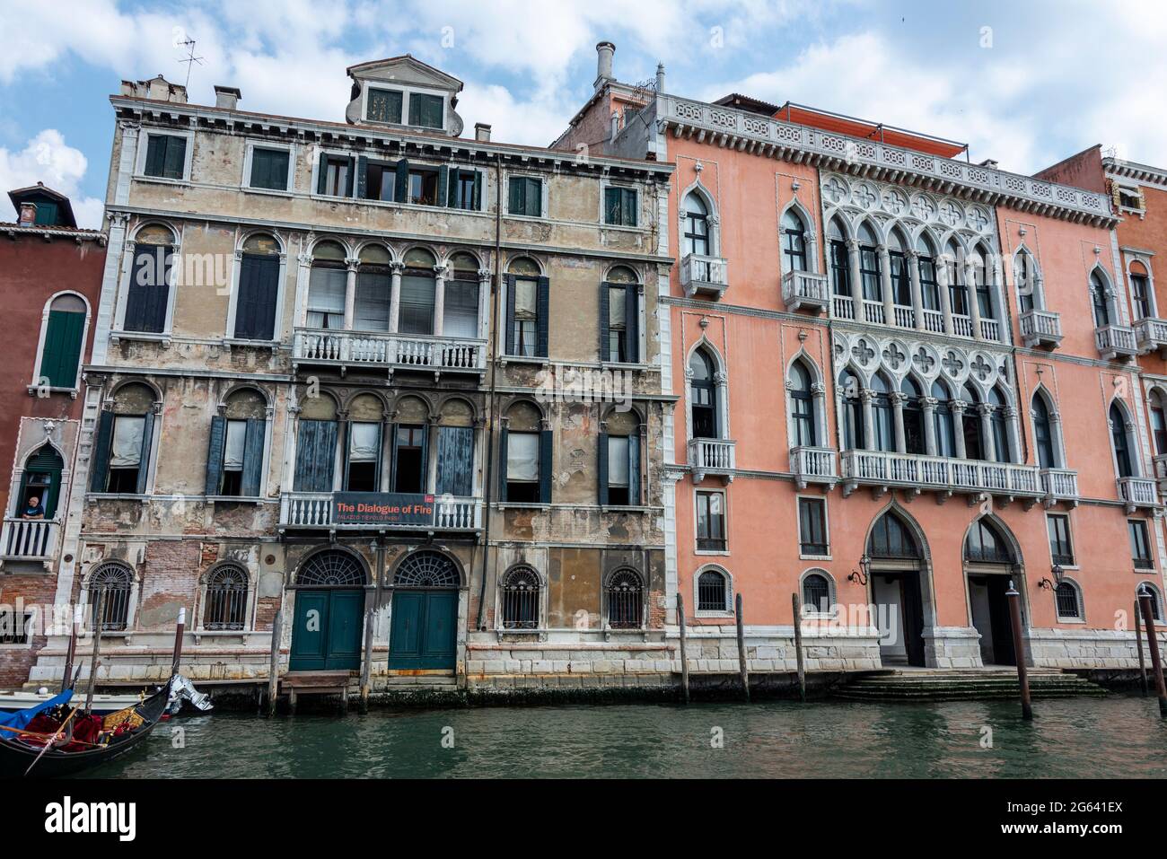 Palazzo Tiepolo Passi and the pink building, Palazzo Pisani Moretta on the banks of the Grand Canal in Venice in the Veneto region of northern Italy. Stock Photo