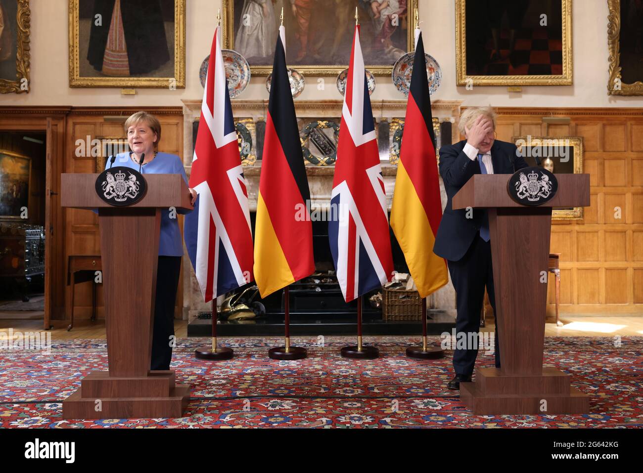 Prime Minister Boris Johnson and the Chancellor of Germany, Angela Merkel, during a press conference after their meeting at Chequers, the country house of the Prime Minister of the United Kingdom, in Buckinghamshire. Picture date: Friday July 2, 2021. Stock Photo