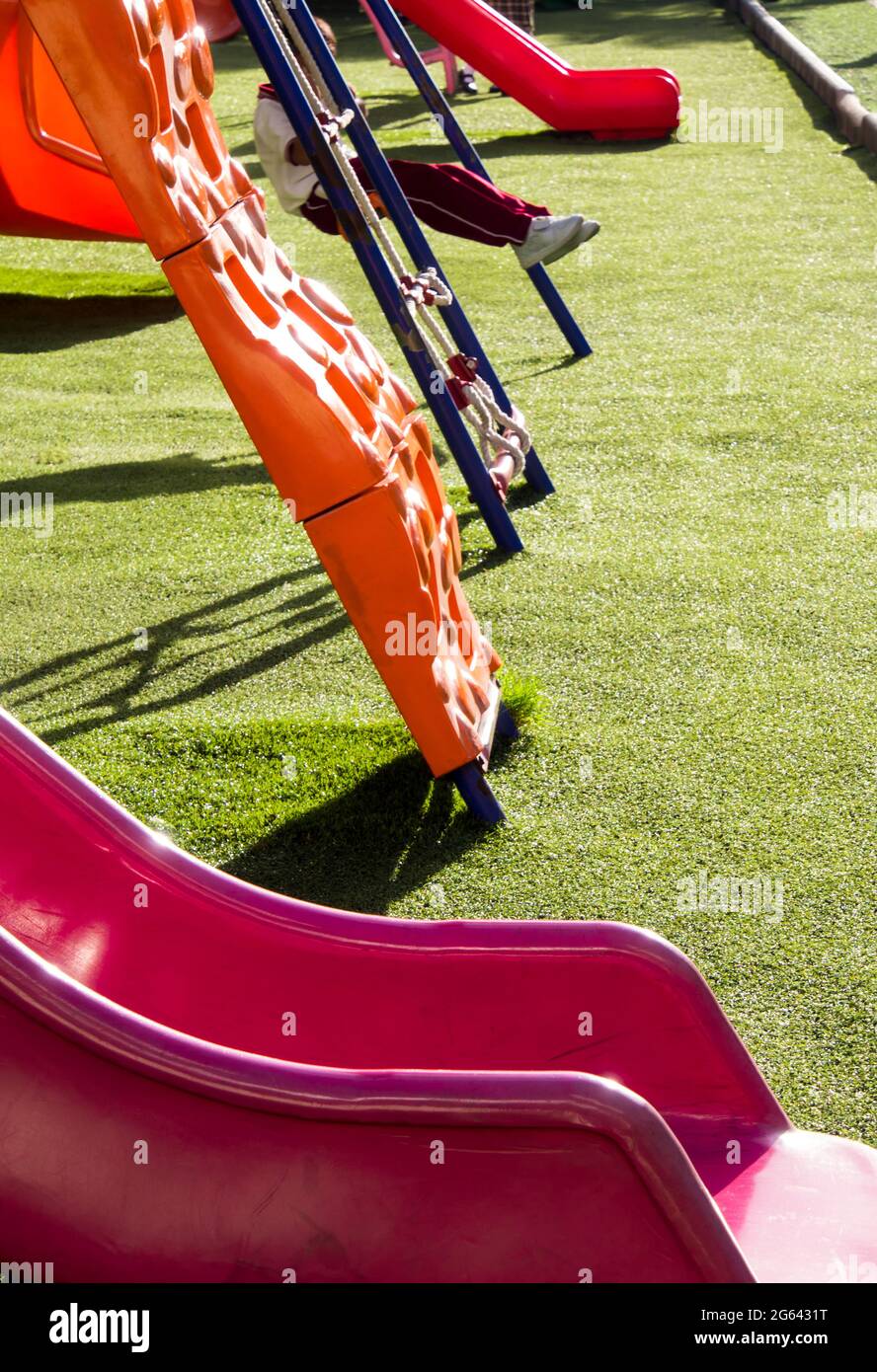 Children play with the toy in the schoolyard Stock Photo