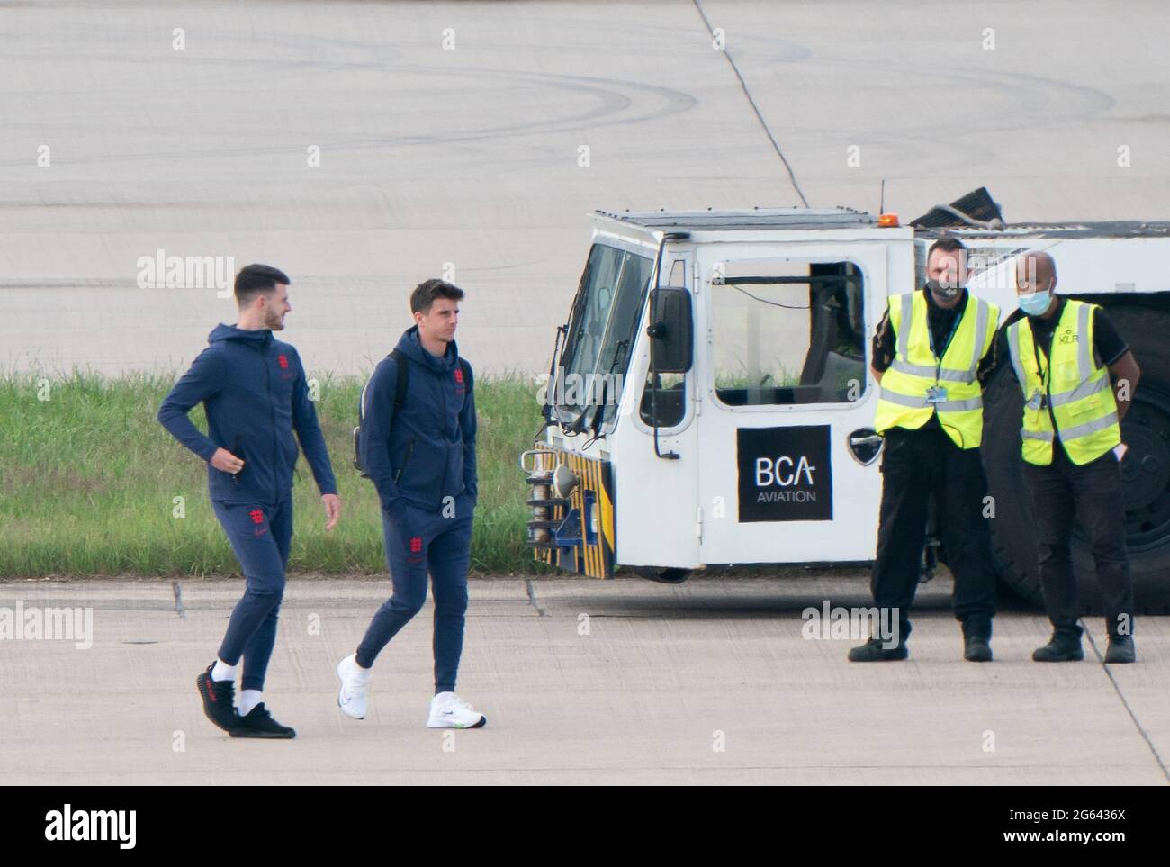 England's Declan Rice (left) and Mason Mount on the tarmac heading to ...