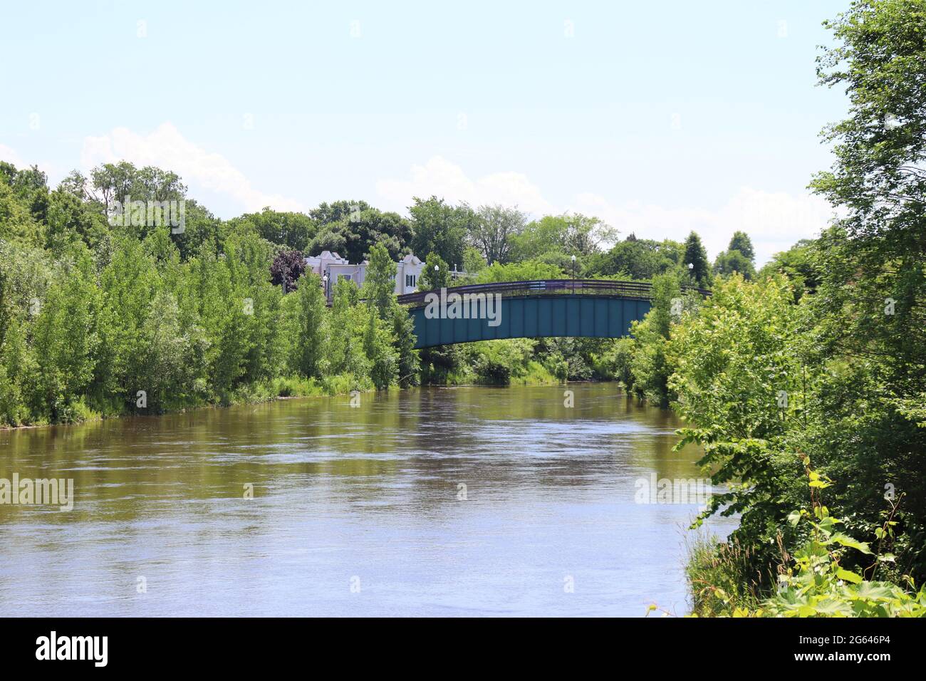 Little bridge and river in summer. Bridge at the St-Charles river in ...