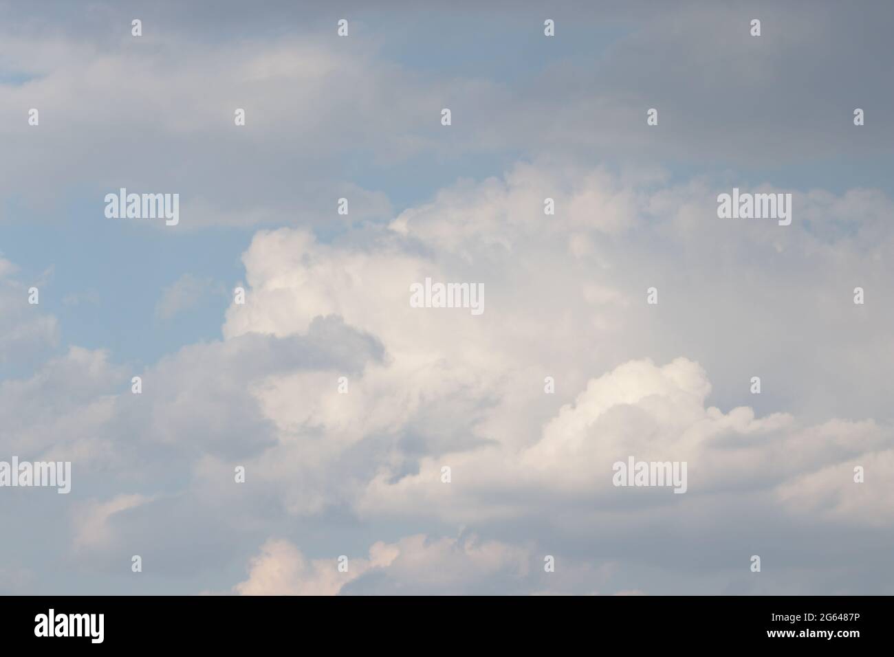 beautiful light blue sky and white and gray fluffy clouds Stock Photo ...