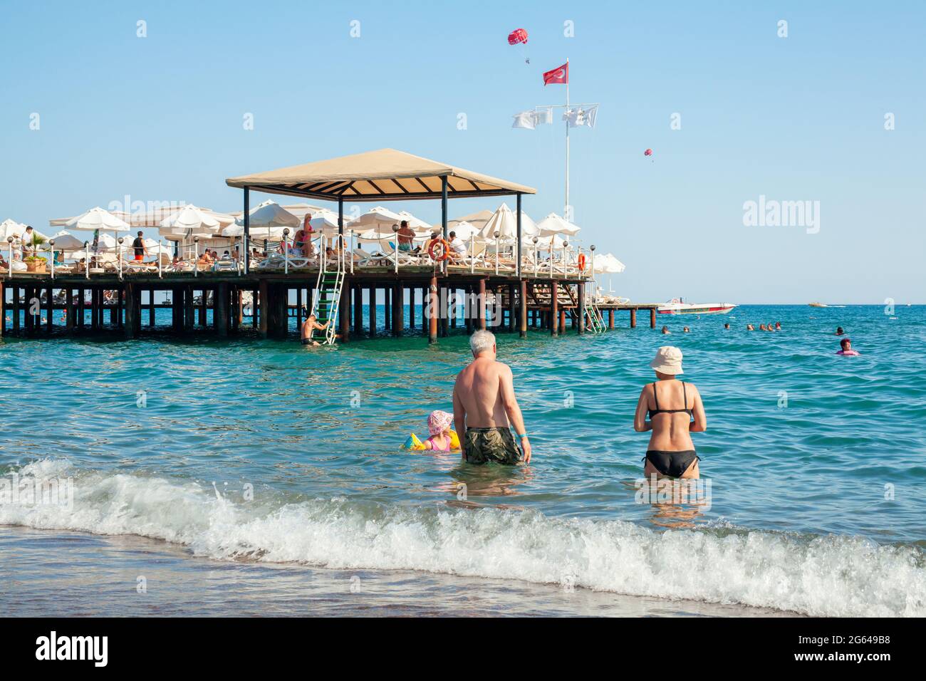 Antalya, TurkeyJune 29, 2021 Beachgoers swimming in the sea or