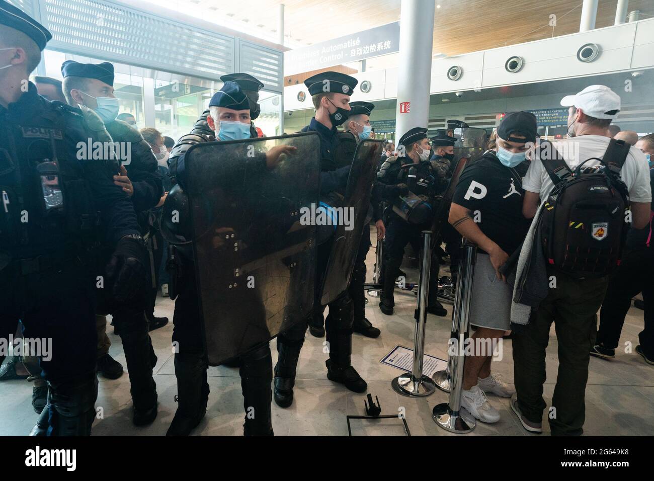 Charles De Gaulle Paris airport workers block terminal to protest for protest. It is the largest