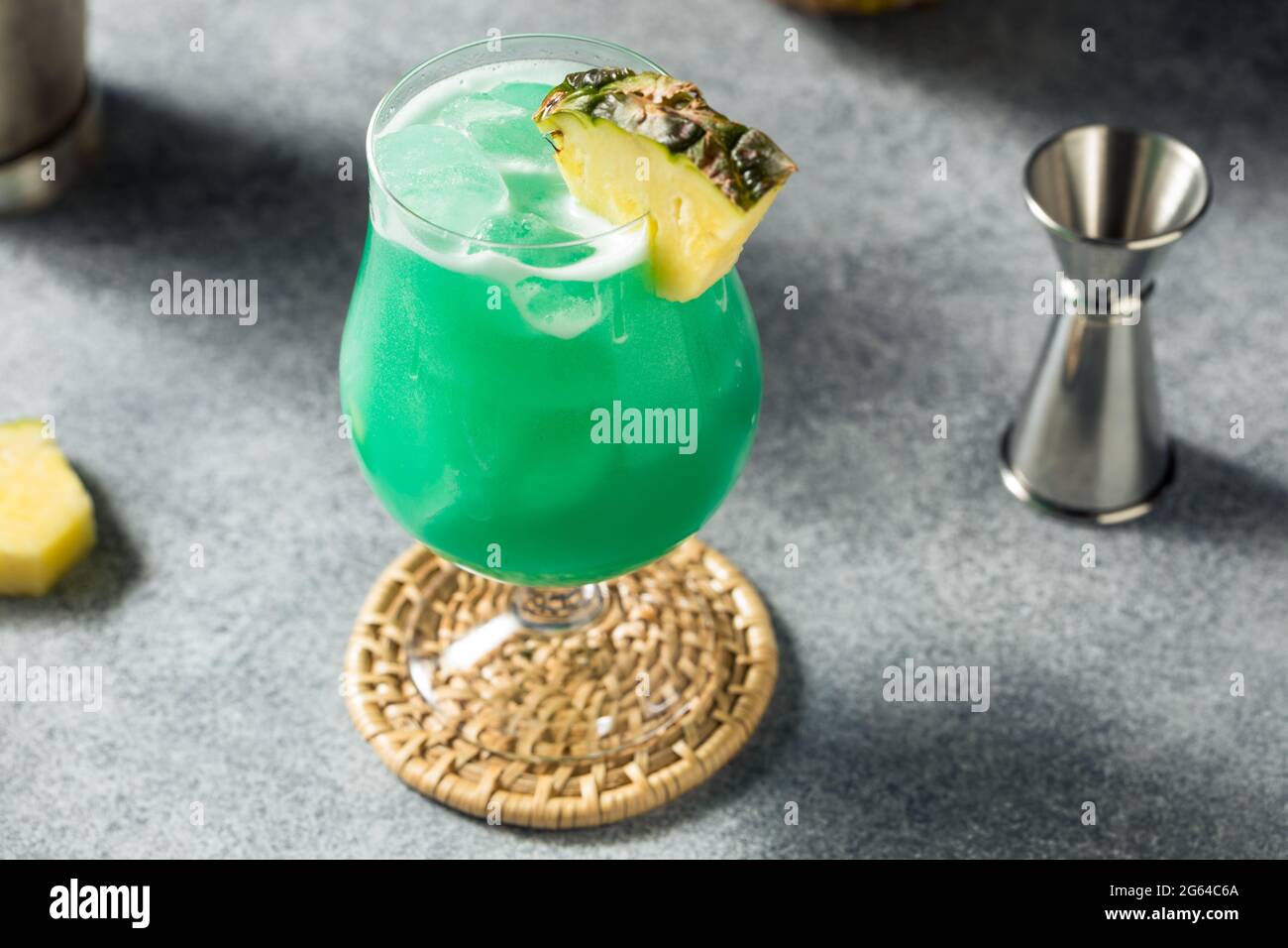 Boozy Refreshing Blue Hawaii Cocktail with Pineapple Stock Photo