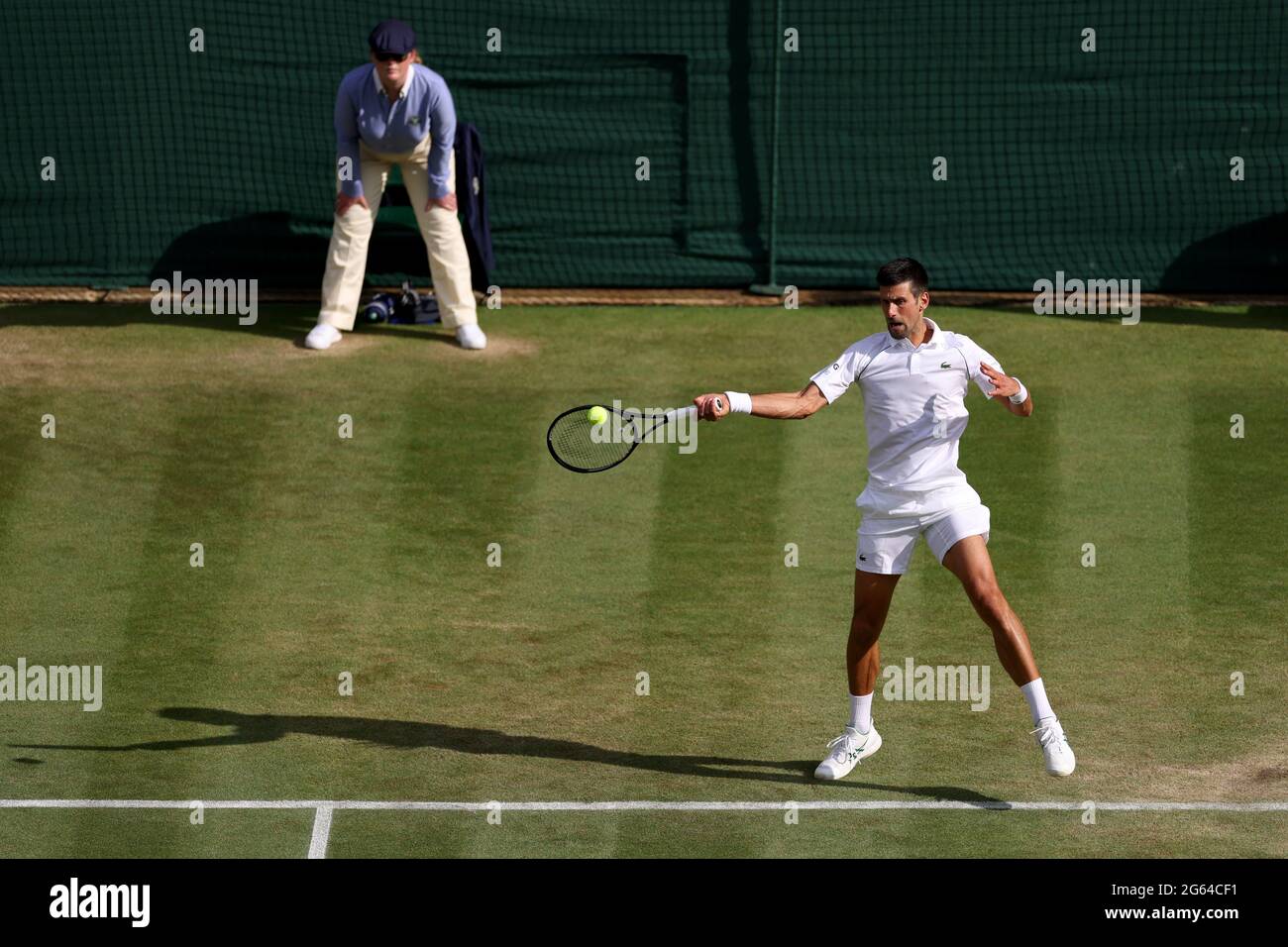 Novak Djokovic in action against Denis Kudla on day five of Wimbledon